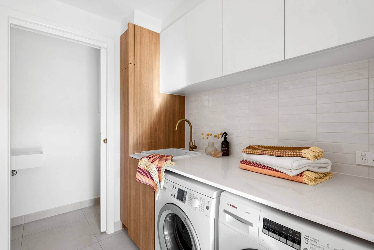 A custom designed laundry. Designed and built by MJ Harris Group.