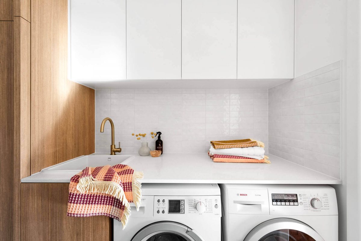 A custom designed laundry. Designed and built by MJ Harris Group.