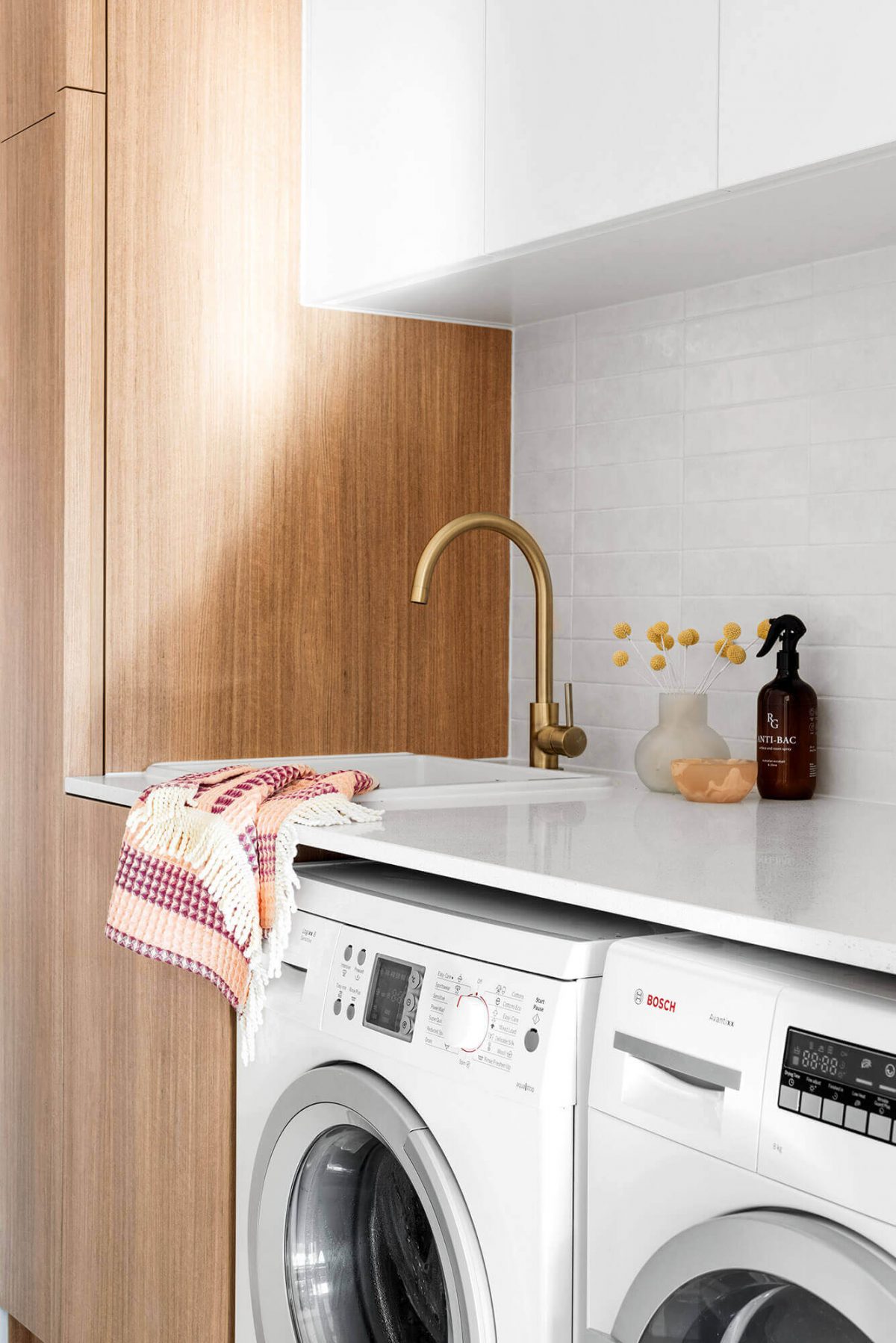 A custom designed laundry. Designed and built by MJ Harris Group.