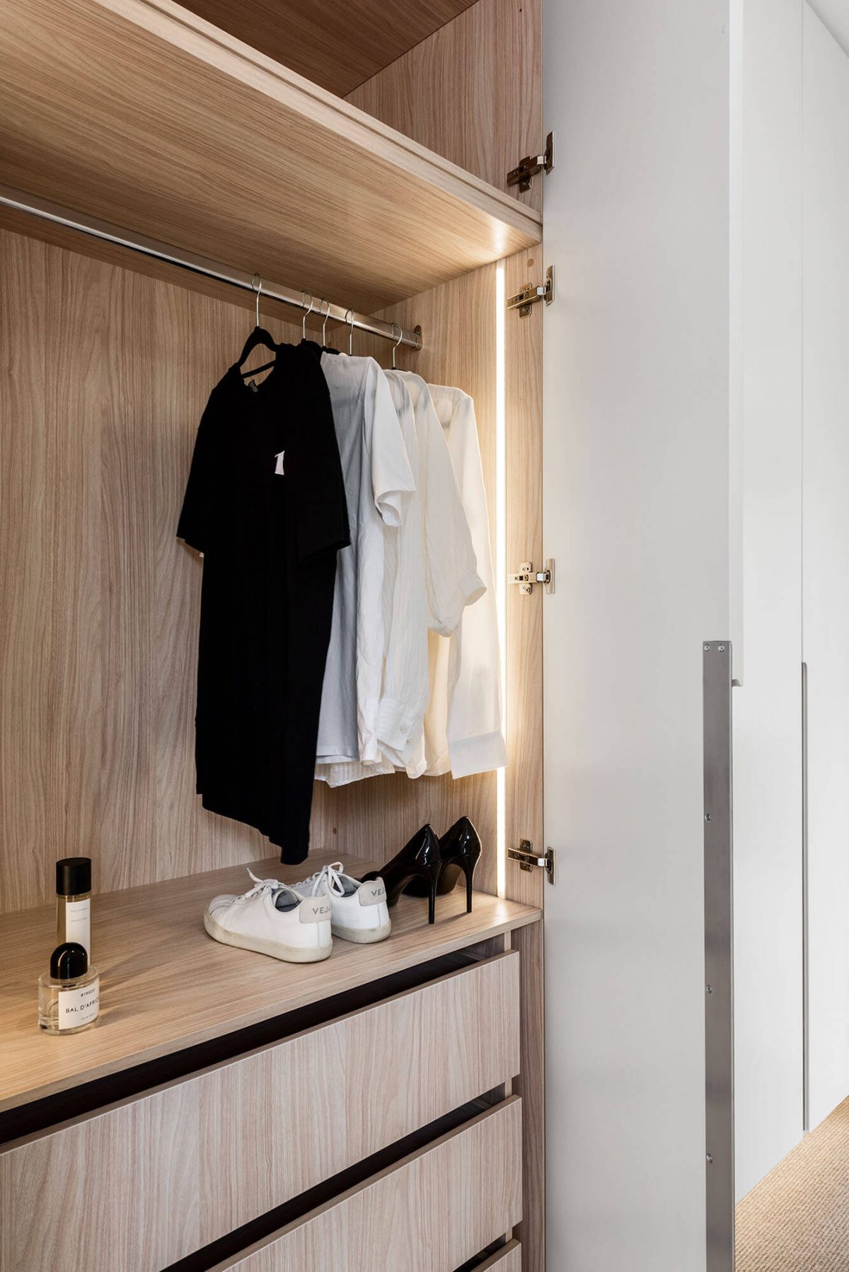 A custom designed wardrobe. Designed and built by MJ Harris Group.