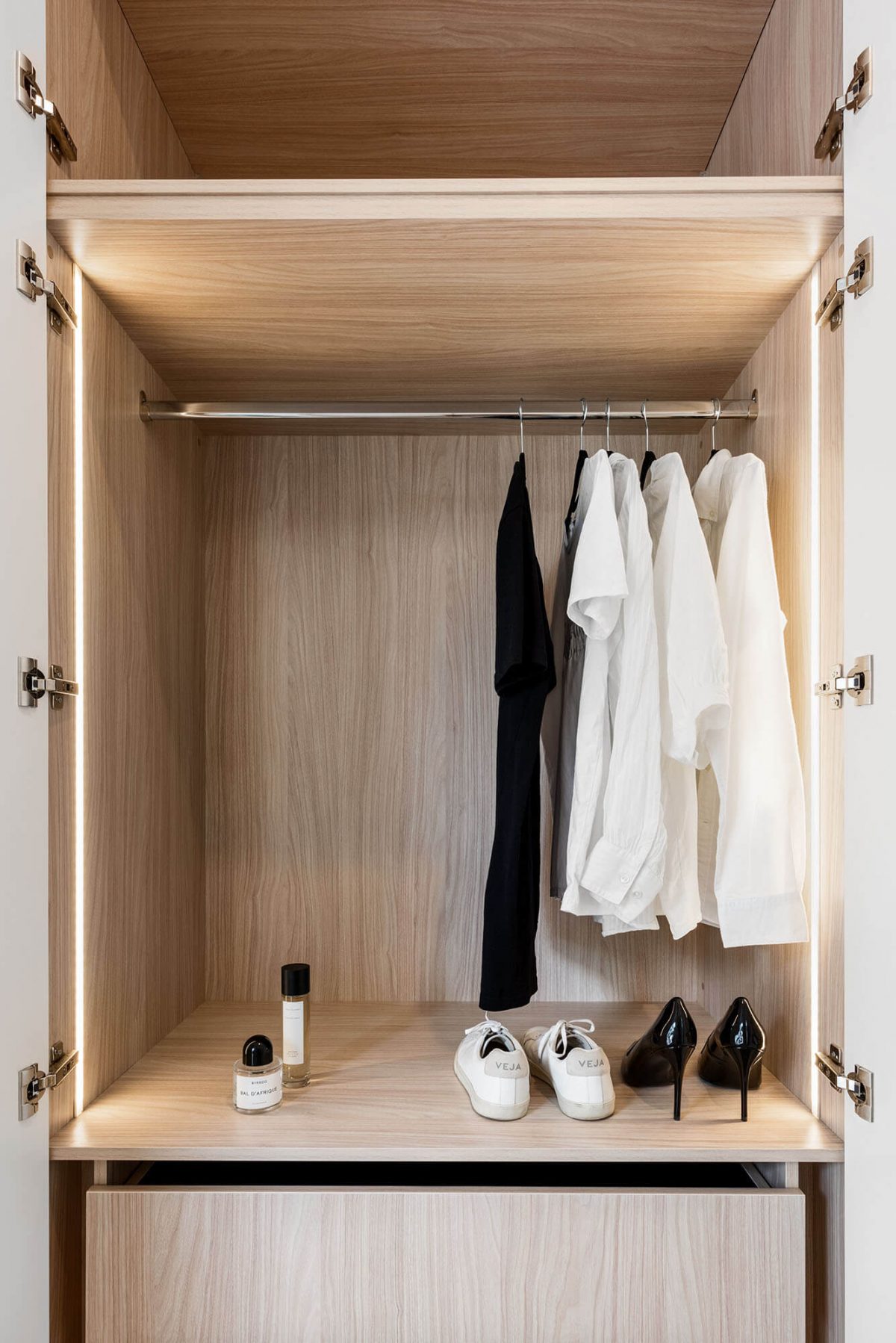 A custom designed wardrobe. Designed and built by MJ Harris Group.