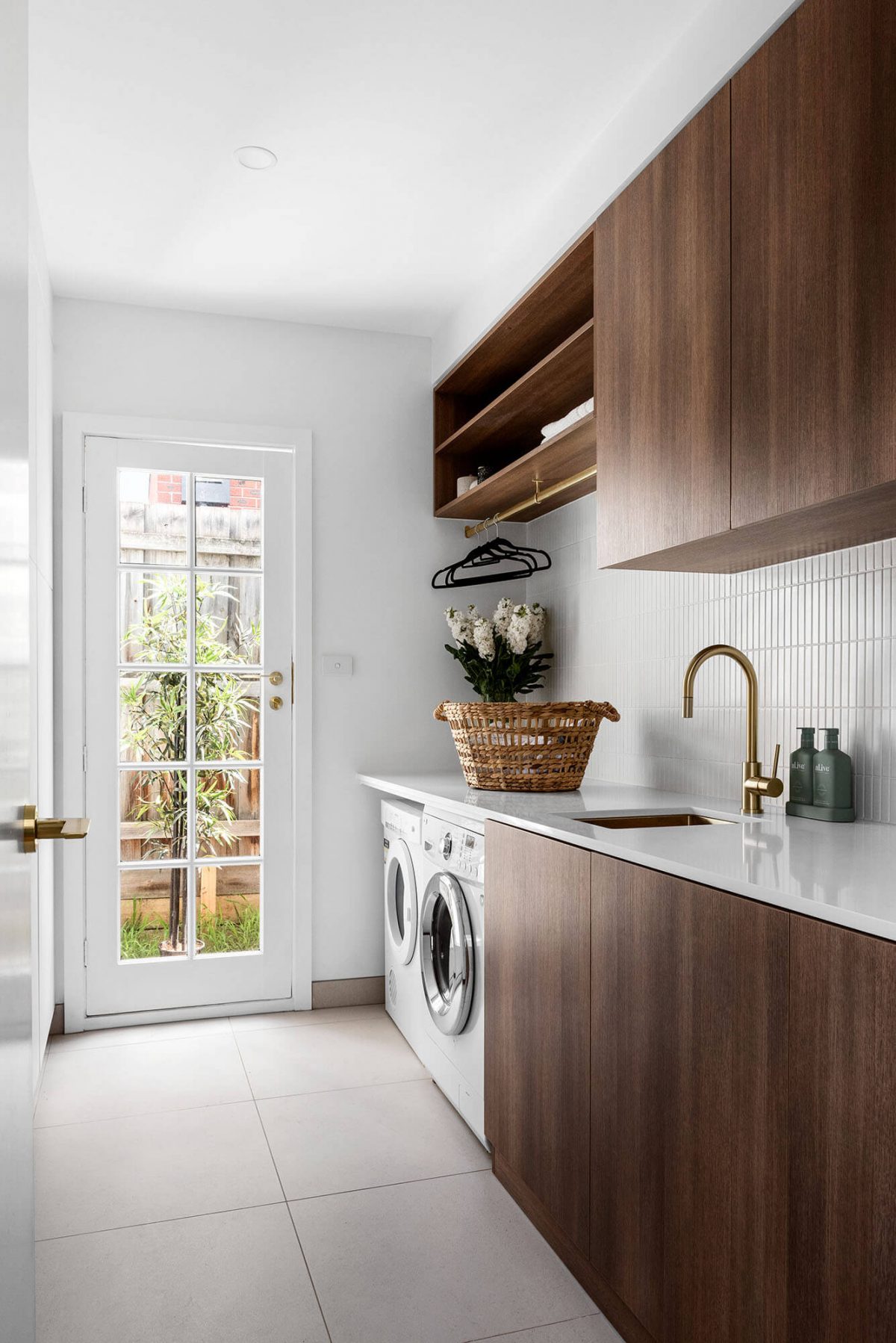 A custom designed laundry. Designed and built by MJ Harris Group.