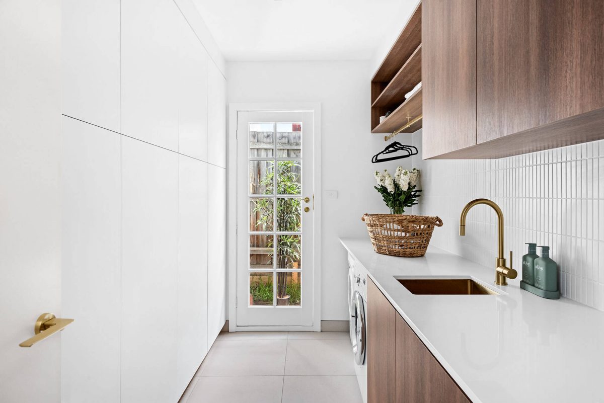 A custom designed laundry. Designed and built by MJ Harris Group.