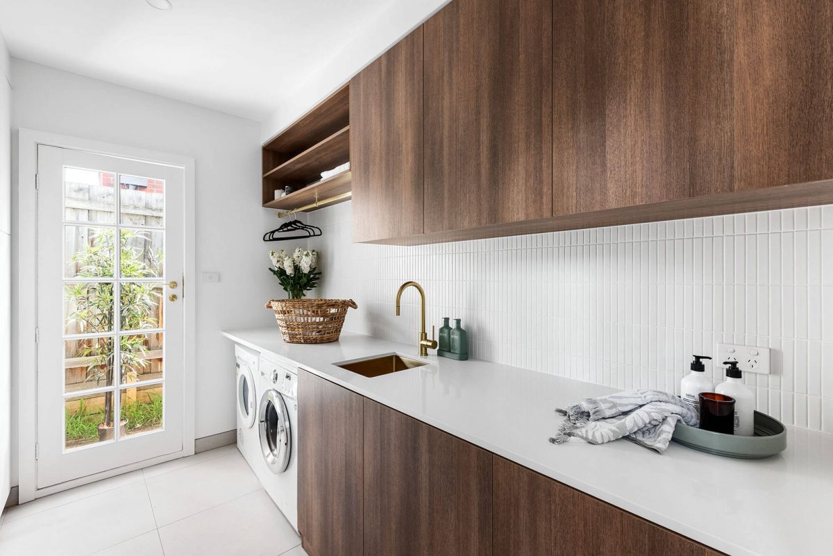 A custom designed laundry. Designed and built by MJ Harris Group.