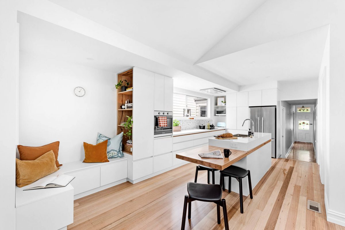 A custom designed white kitchen. Designed and built by MJ Harris Group.