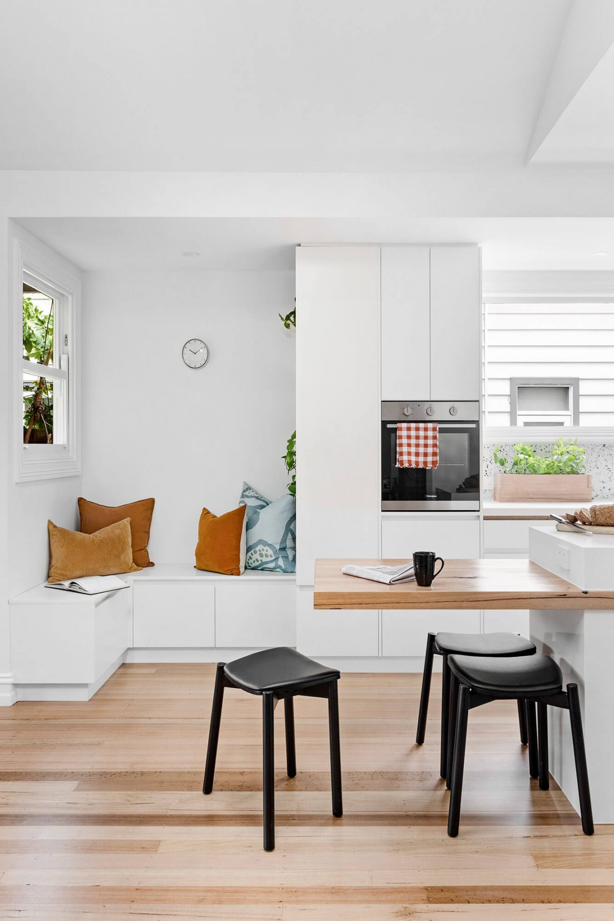 A custom designed white kitchen. Designed and built by MJ Harris Group.