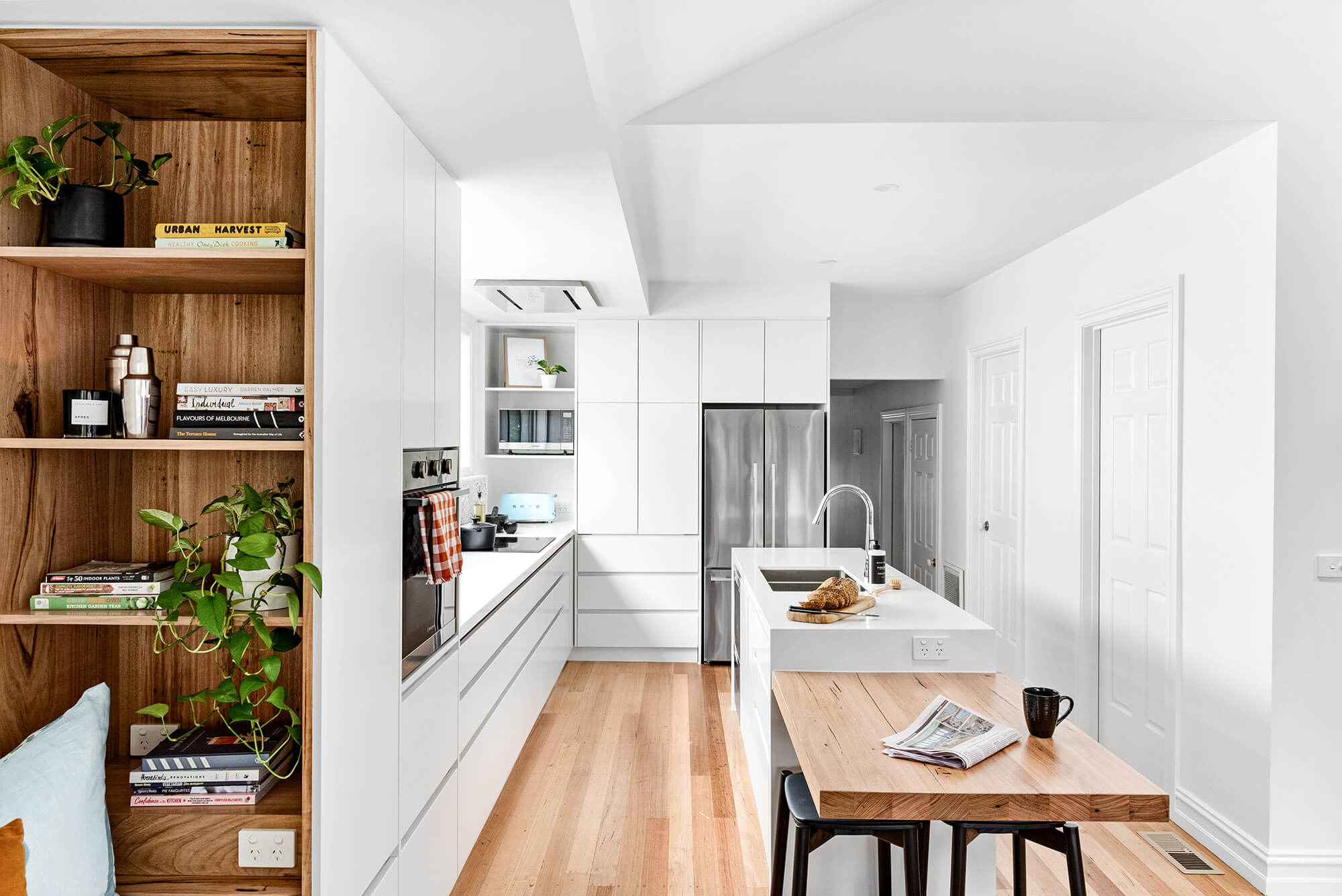 A custom designed white kitchen. Designed and built by MJ Harris Group.