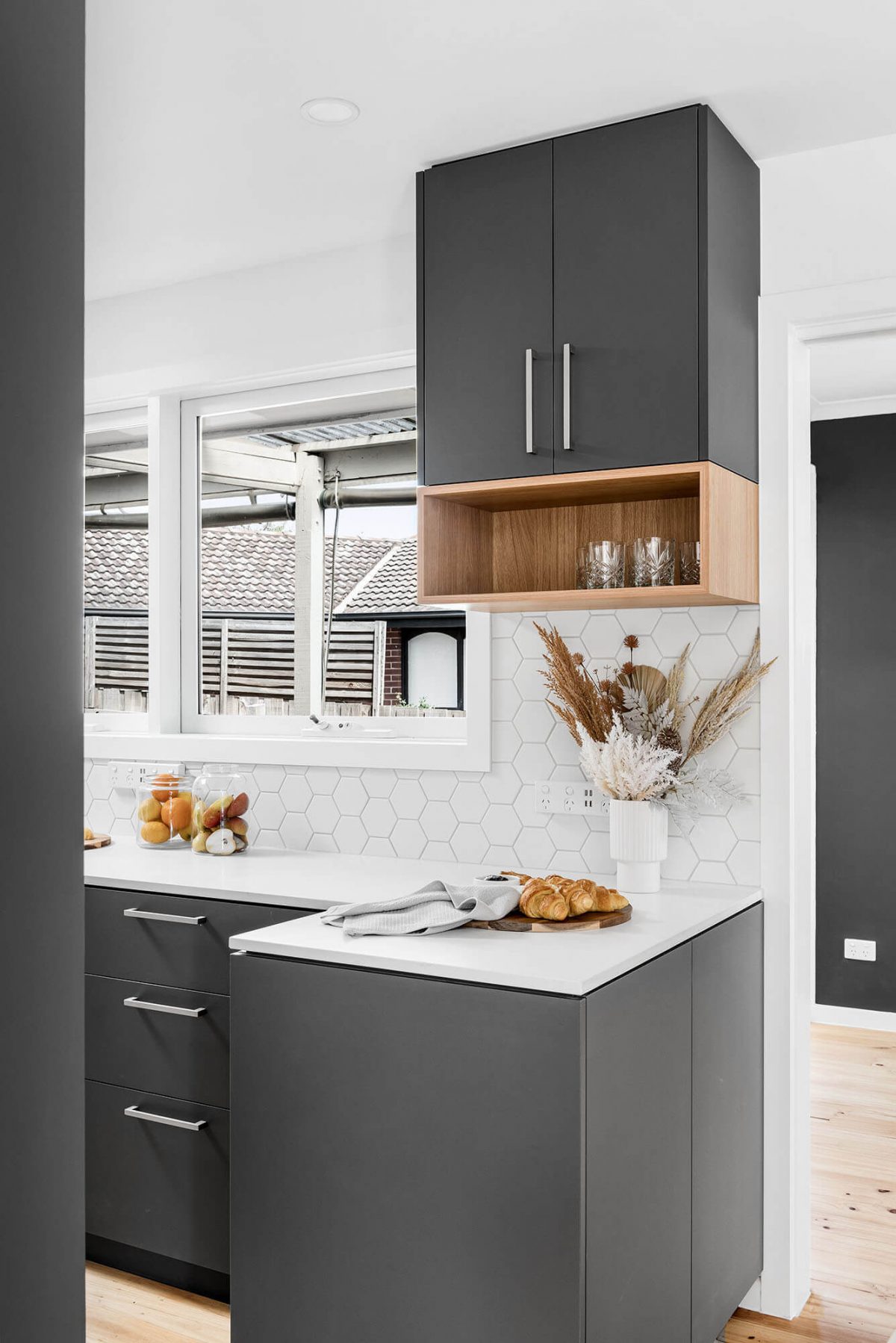A custom designed kitchen. Designed and built by MJ Harris Group.