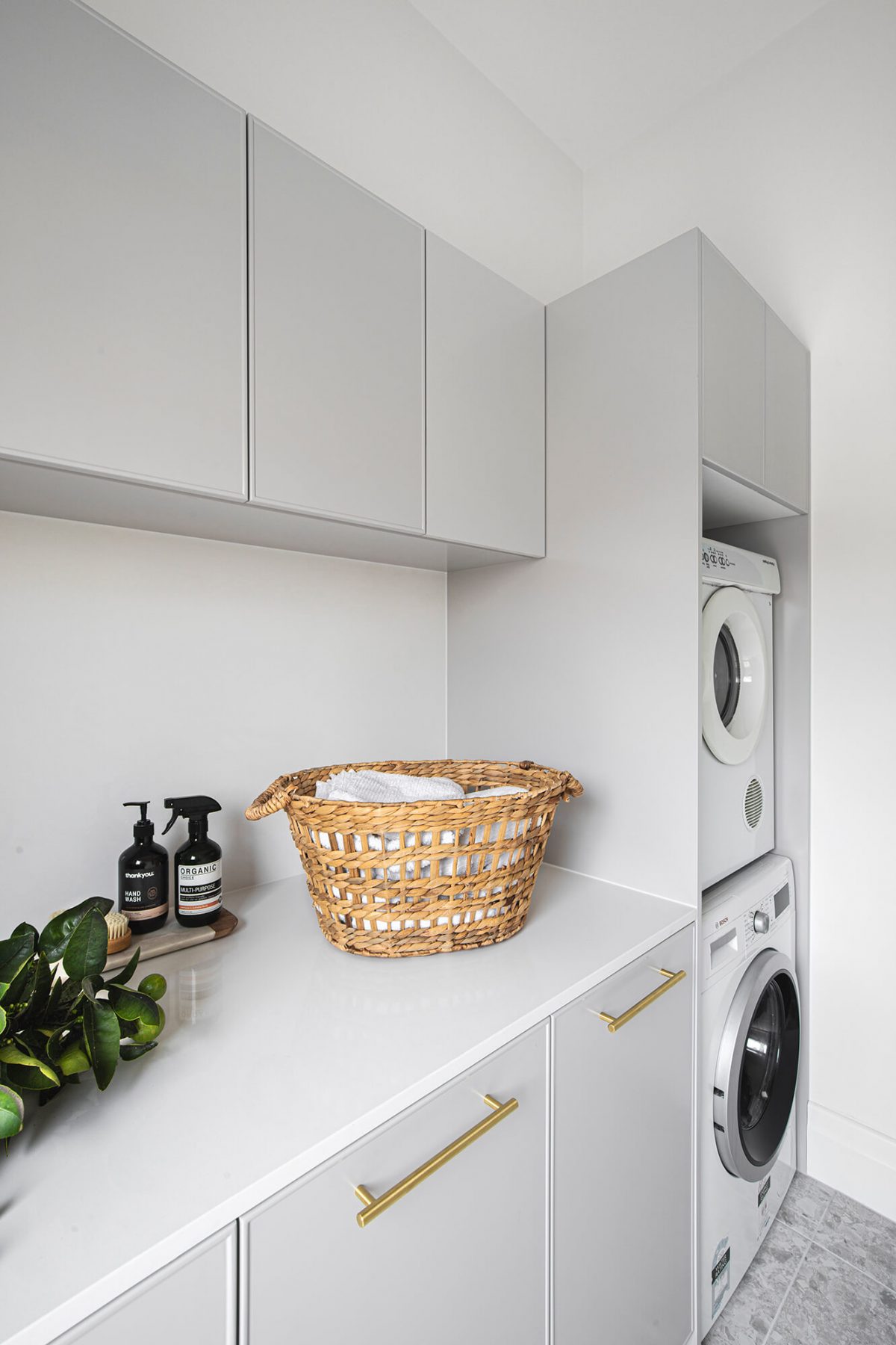 A custom designed laundry. Designed and built by MJ Harris Group.