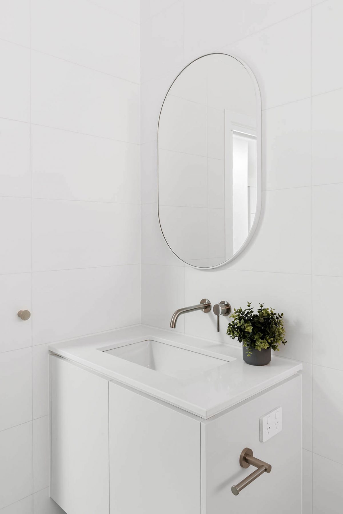 white vanity oval mirror Richmond bathroom reno