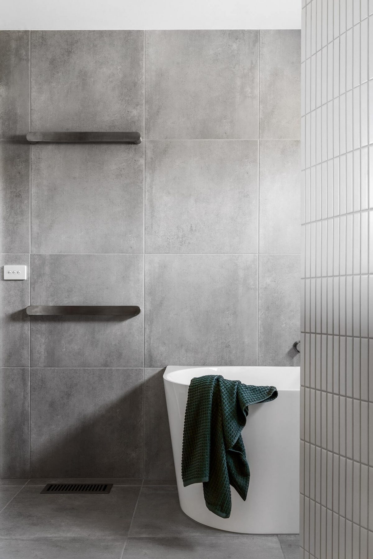 A custom designed Jack and Jill bathroom. Designed and built by MJ Harris Group.