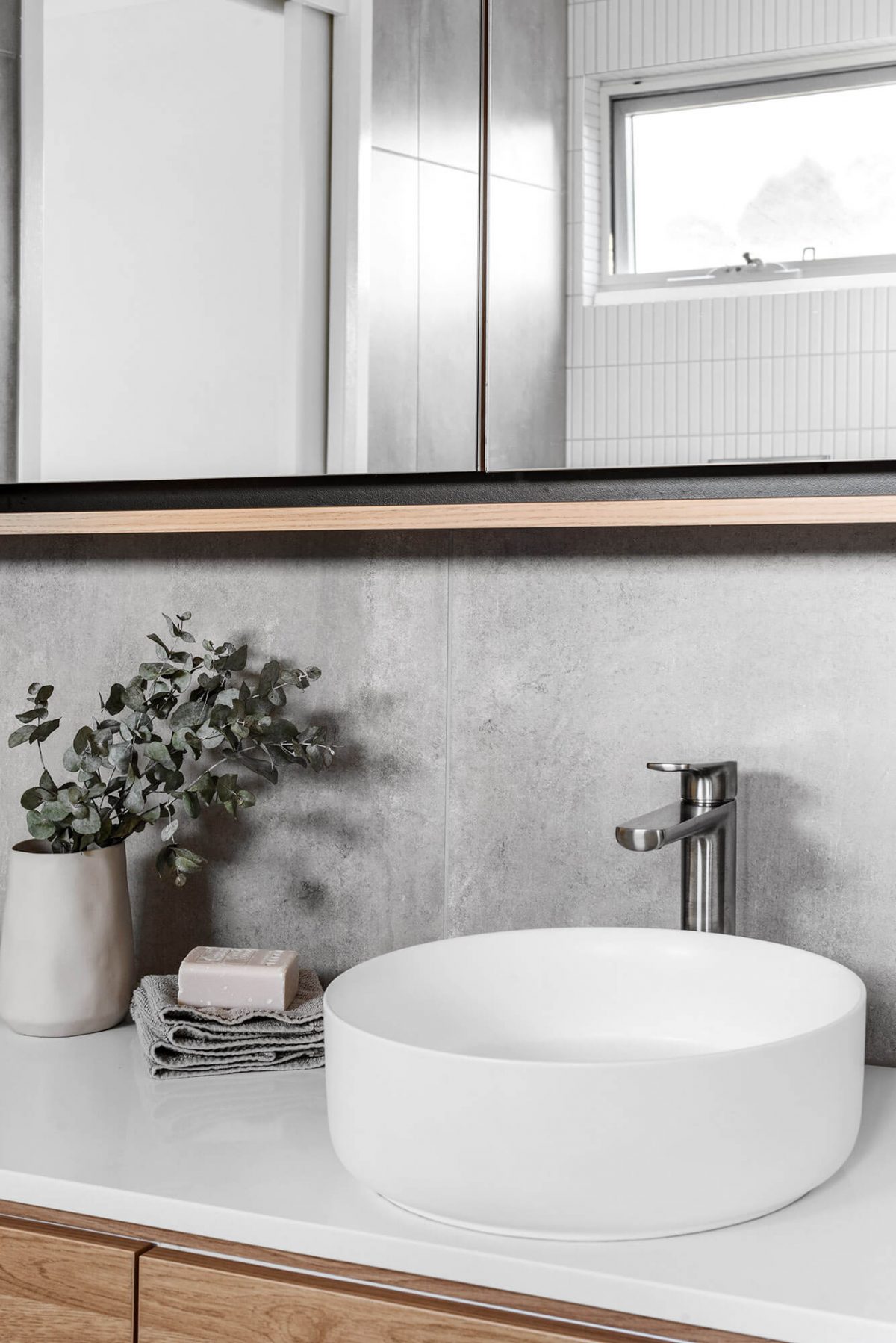 A custom designed Jack and Jill bathroom. Designed and built by MJ Harris Group.