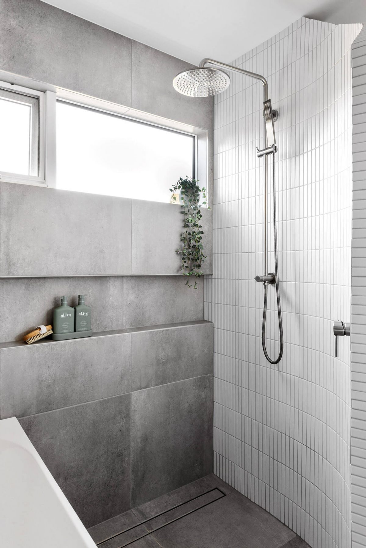 A custom designed Jack and Jill bathroom. Designed and built by MJ Harris Group.