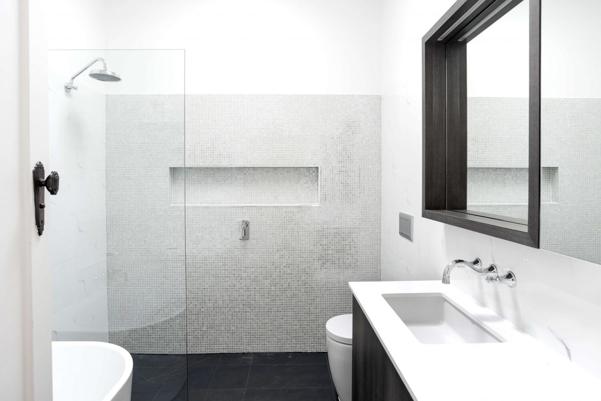 A custom designed bathroom featuring chrome fixtures. Designed and built by MJ Harris Group. #MJHxSheirsSt