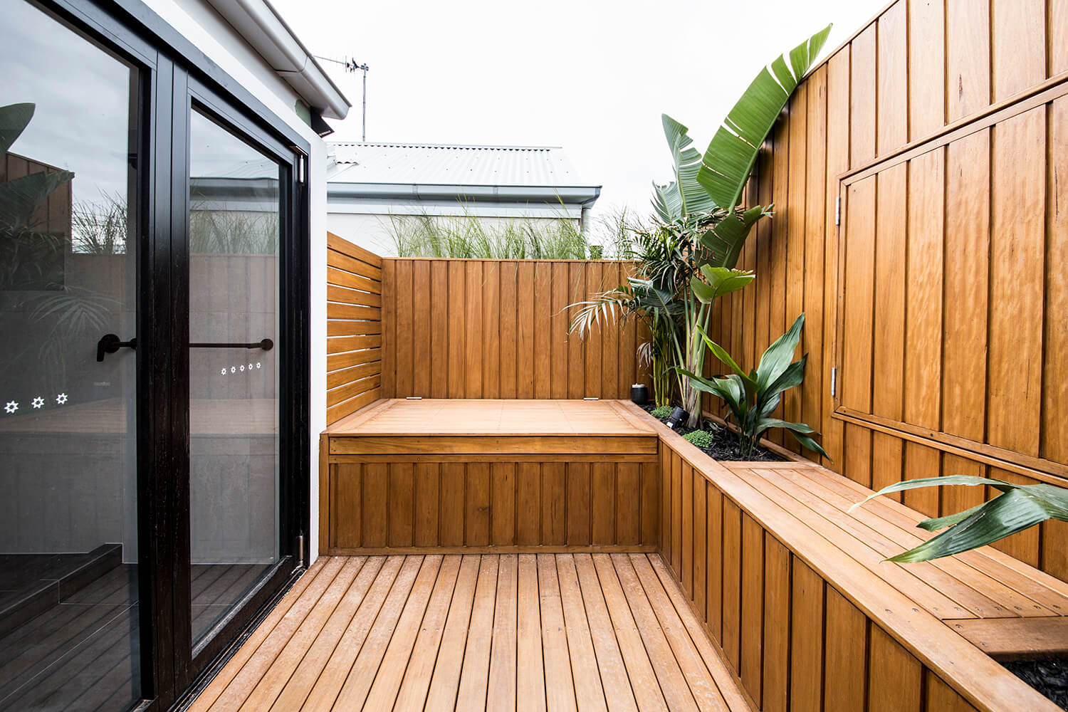 A custom designed outdoor area. Designed and built by MJ Harris Group.