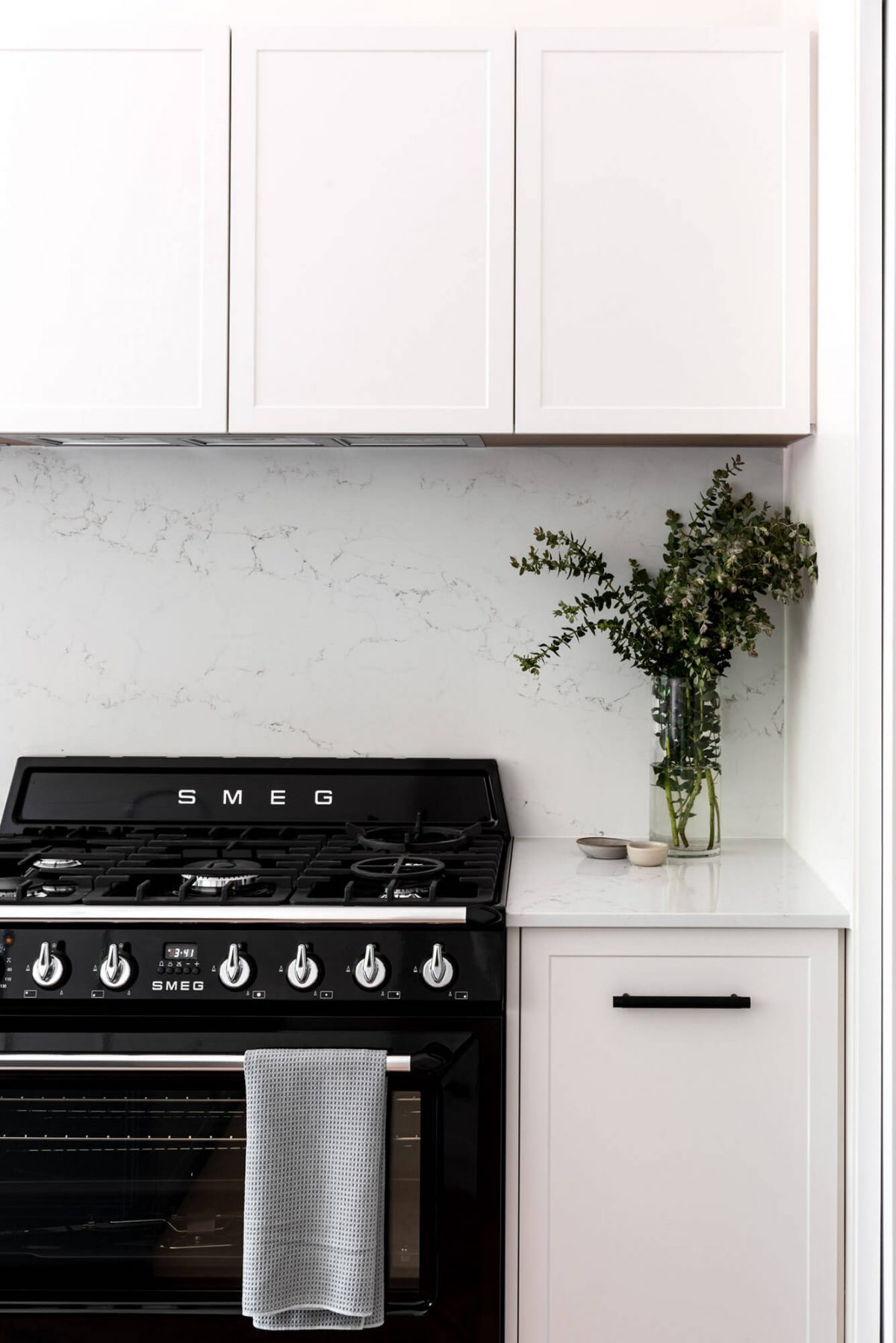 A custom designed kitchen featuring custom joinery. Designed and built by MJ Harris Group. #MJHxRutlandSt