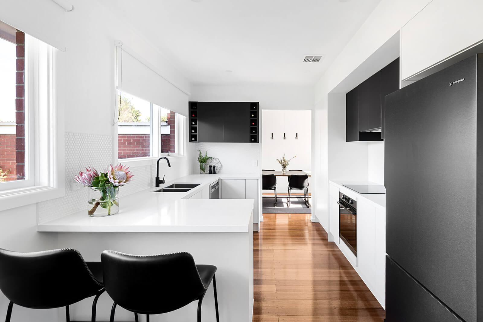 A custom designed kitchen featuring custom joinery. Designed and built by MJ Harris Group. #MJHxWimmeraSt