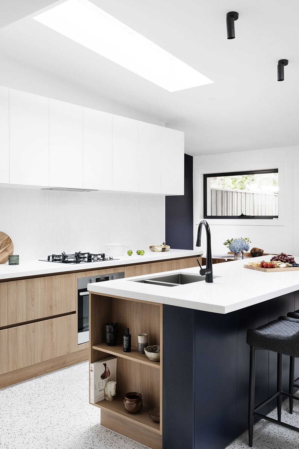 A custom designed kitchen featuring custom joinery and a walk in pantry. Designed and built by MJ Harris Group. #MJHxVictoriaSt