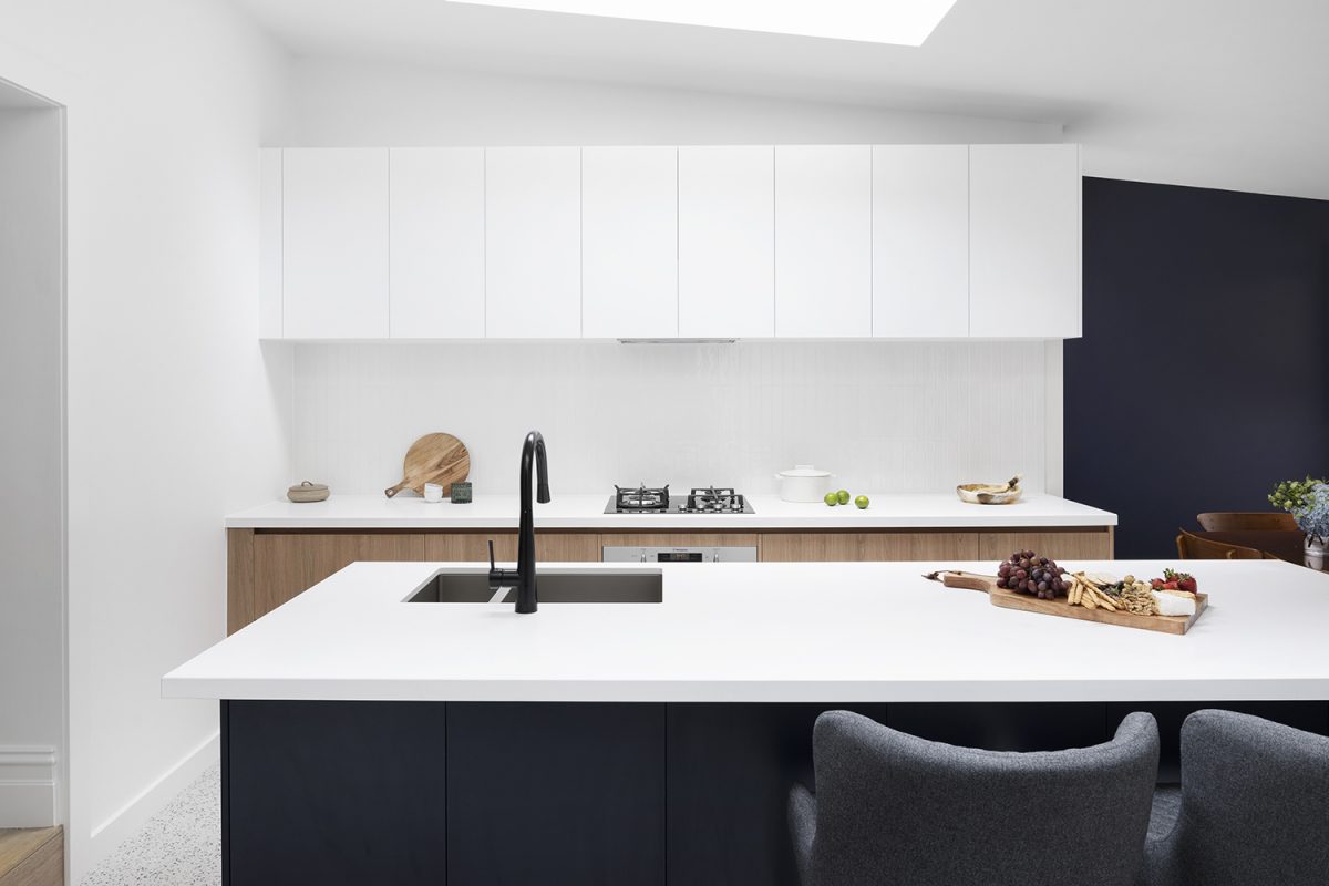 A custom designed kitchen featuring custom joinery and a walk in pantry. Designed and built by MJ Harris Group. #MJHxVictoriaSt
