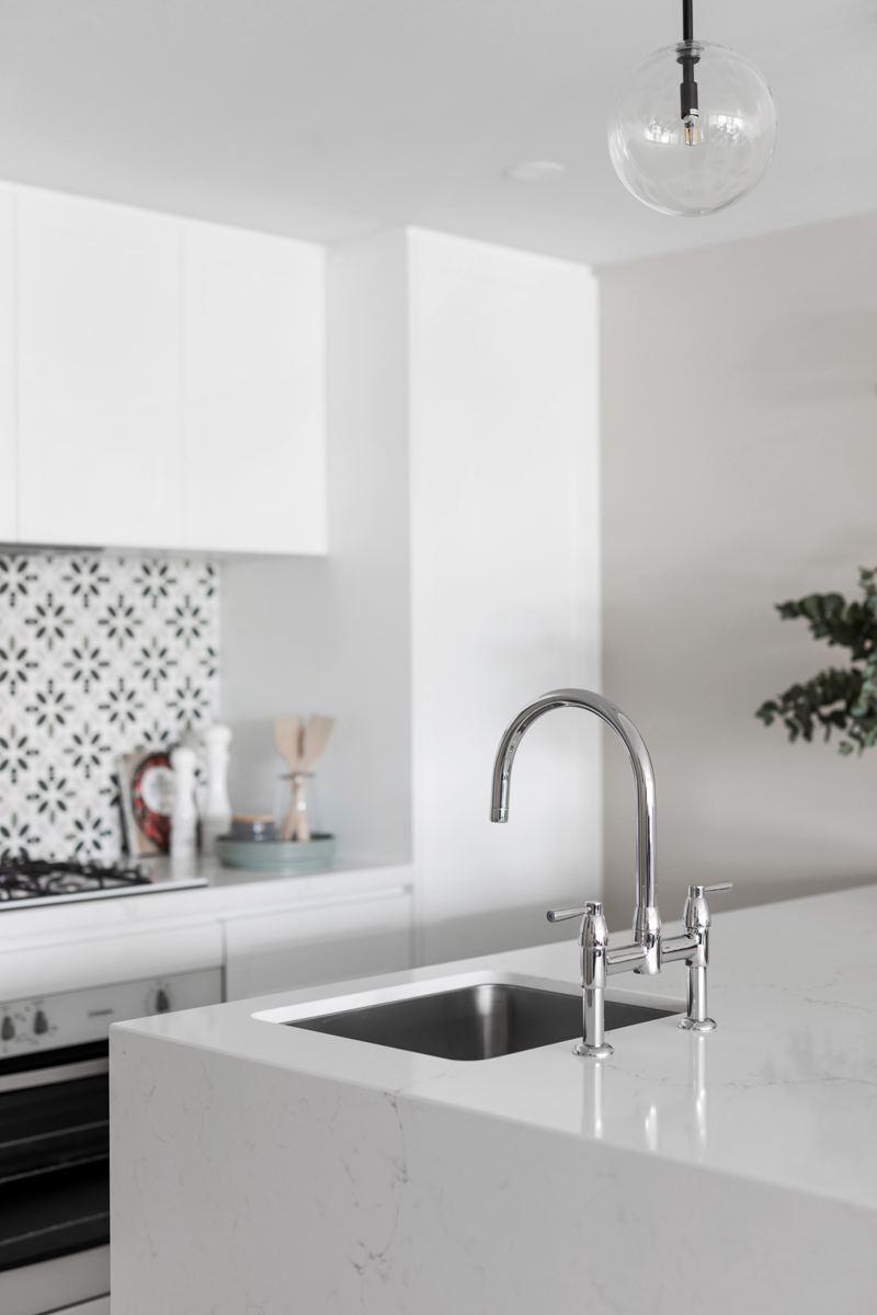 A custom designed kitchen featuring a tiled splashback. Designed and built by MJ Harris Group. #MJHxTheAvenue