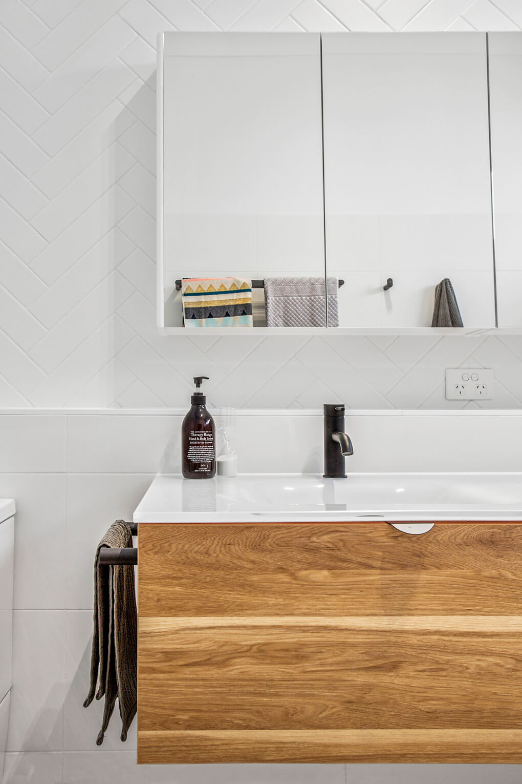 A custom designed bathroom featuring custom joinery. Designed and built by MJ Harris Group. #MJHxHaroldSt