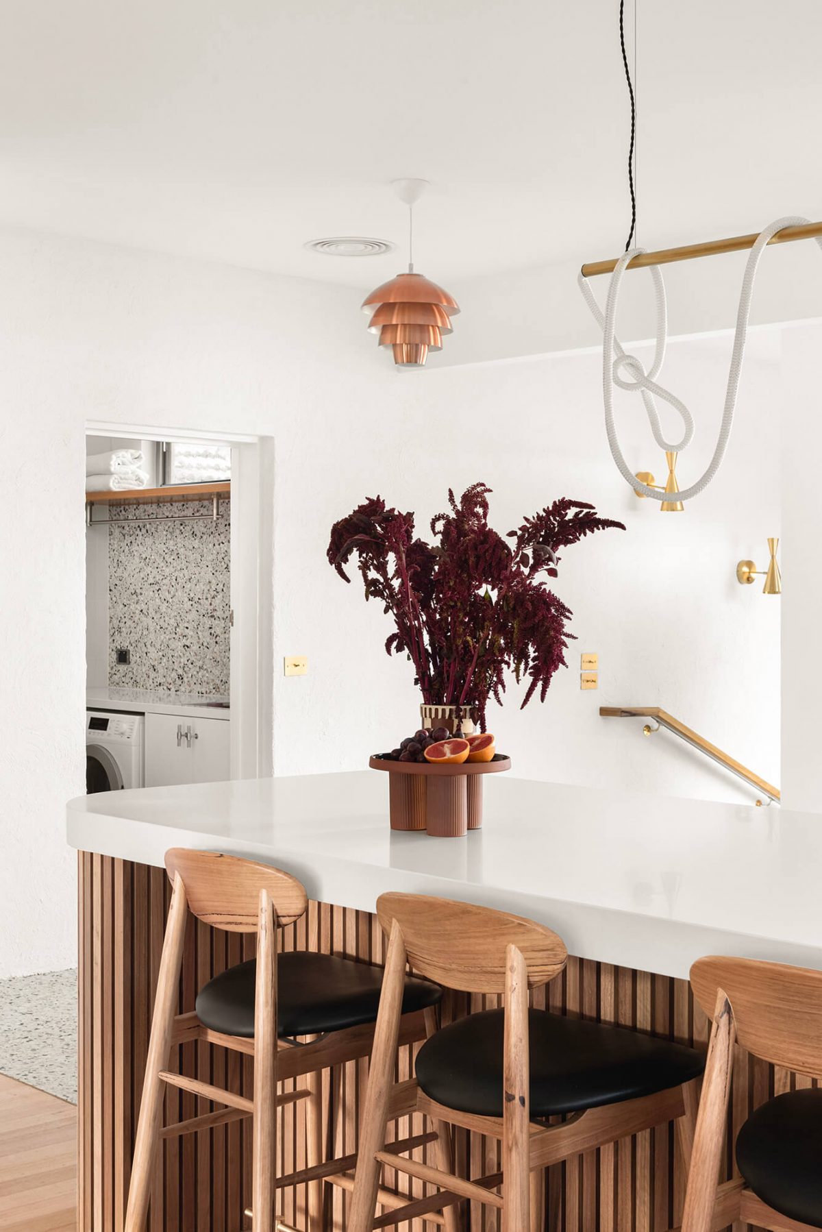 A custom designed dining area featuring a white bench top. Designed and built by MJ Harris Group. #MJHxMasonSt