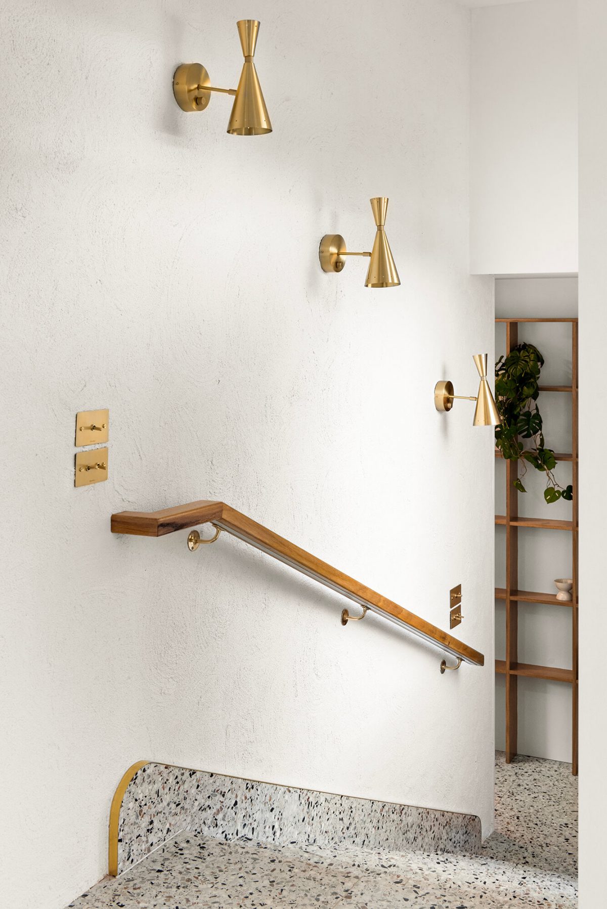 A custom designed stairway featuring terrazzo tiles. Designed and built by MJ Harris Group. #MJHxMasonSt
