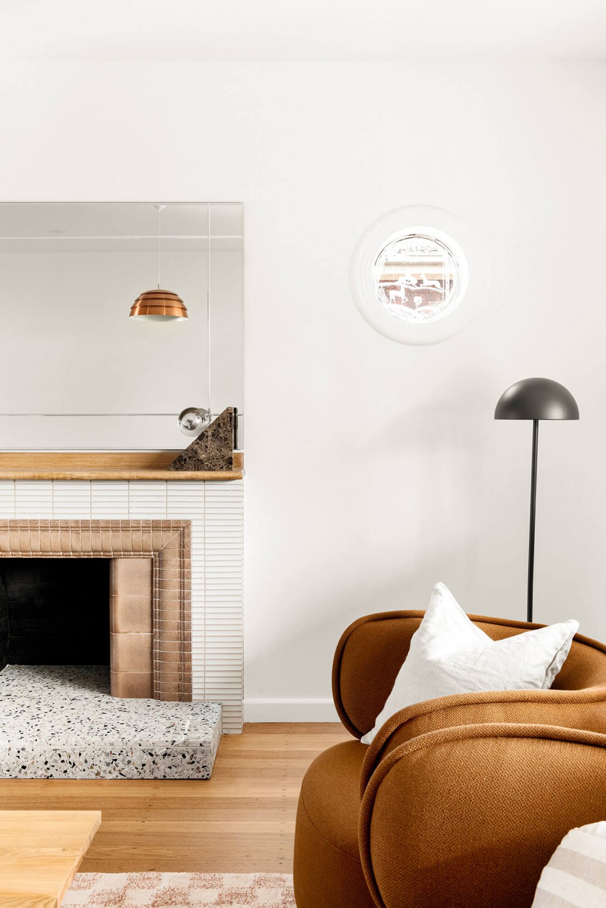 A custom designed living space featuring a tiled fireplace. Designed and built by MJ Harris Group. #MJHxMasonSt