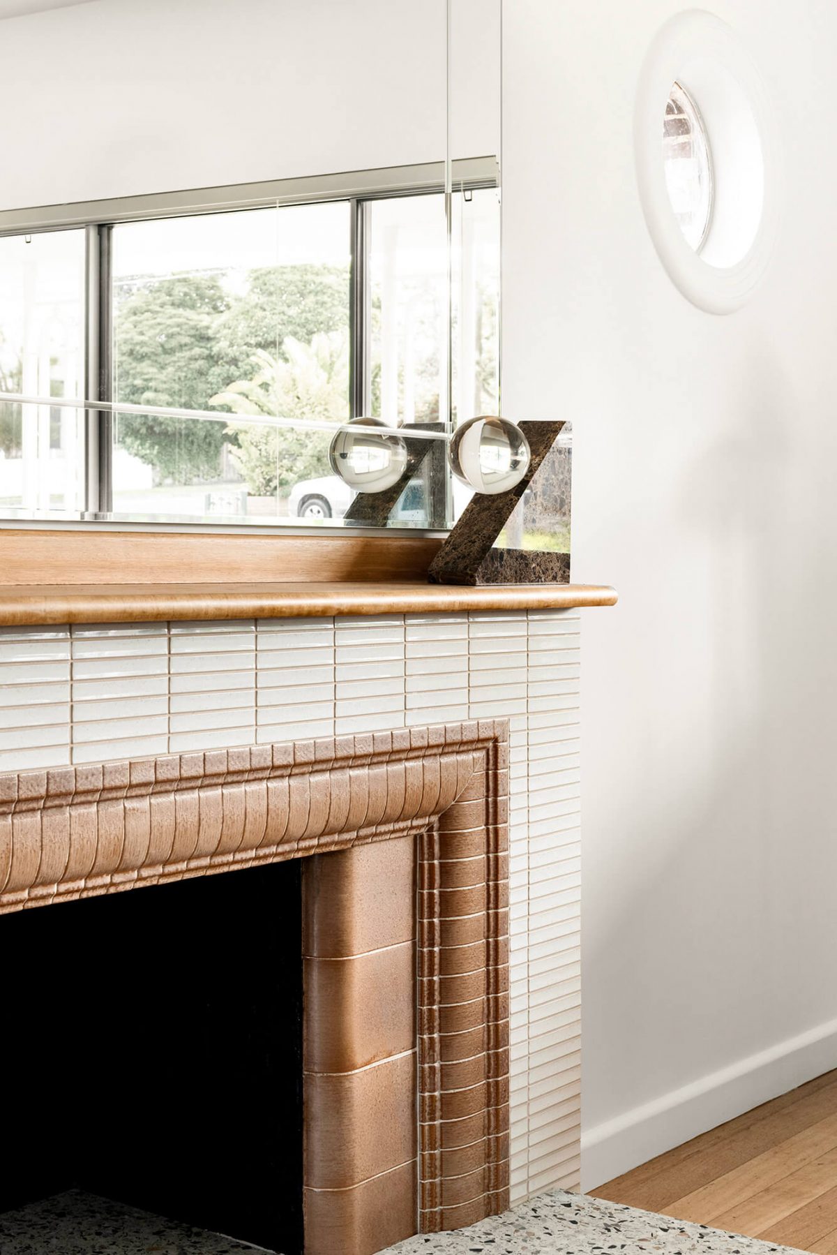 A custom designed living space featuring a tiled fireplace. Designed and built by MJ Harris Group. #MJHxMasonSt