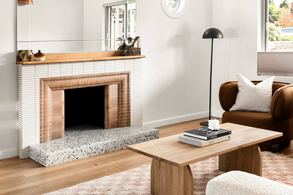 A custom designed living space featuring a tiled fireplace. Designed and built by MJ Harris Group. #MJHxMasonSt