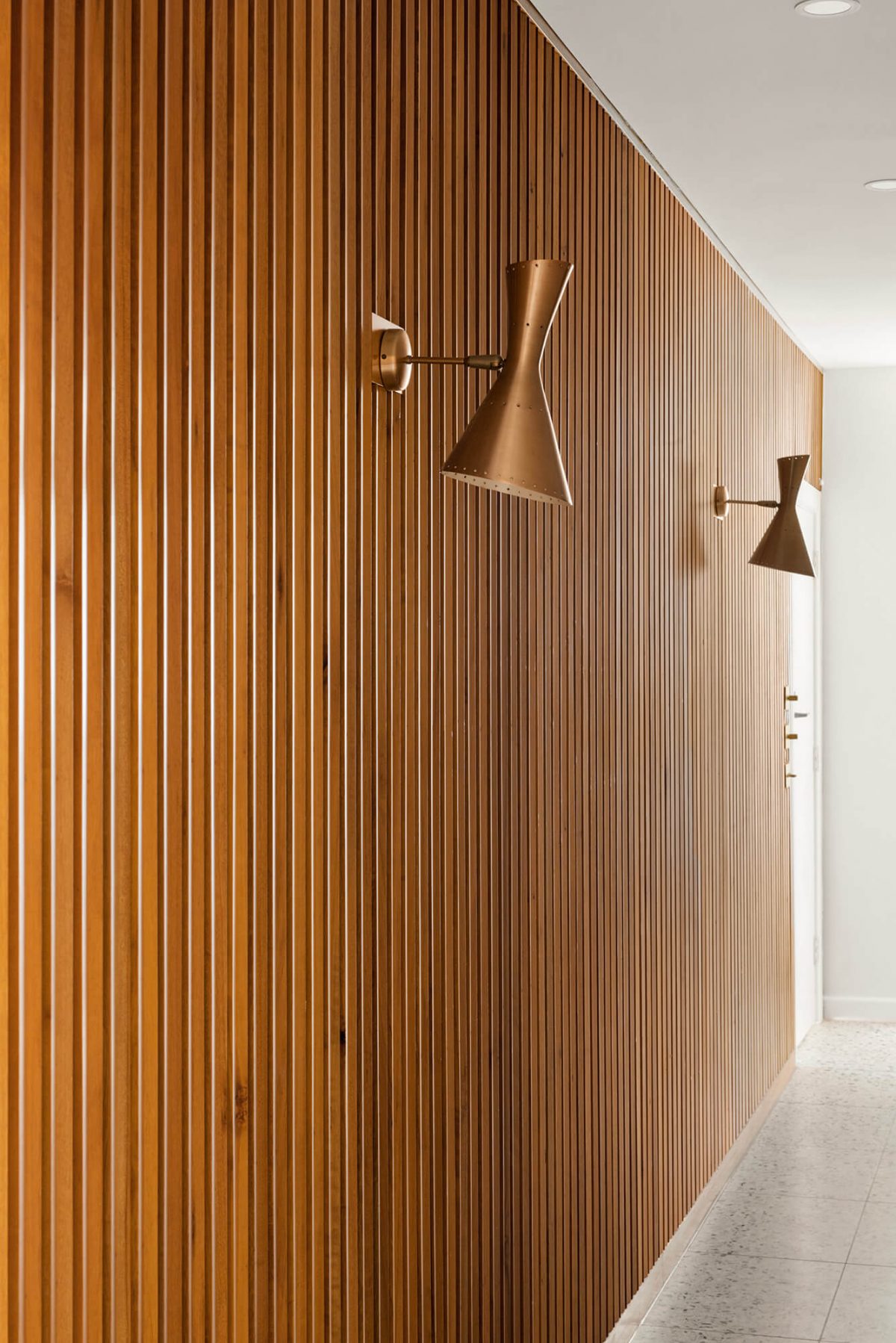 A custom designed hallway featuring terrazzo. Designed and built by MJ Harris Group. #MJHxMasonSt