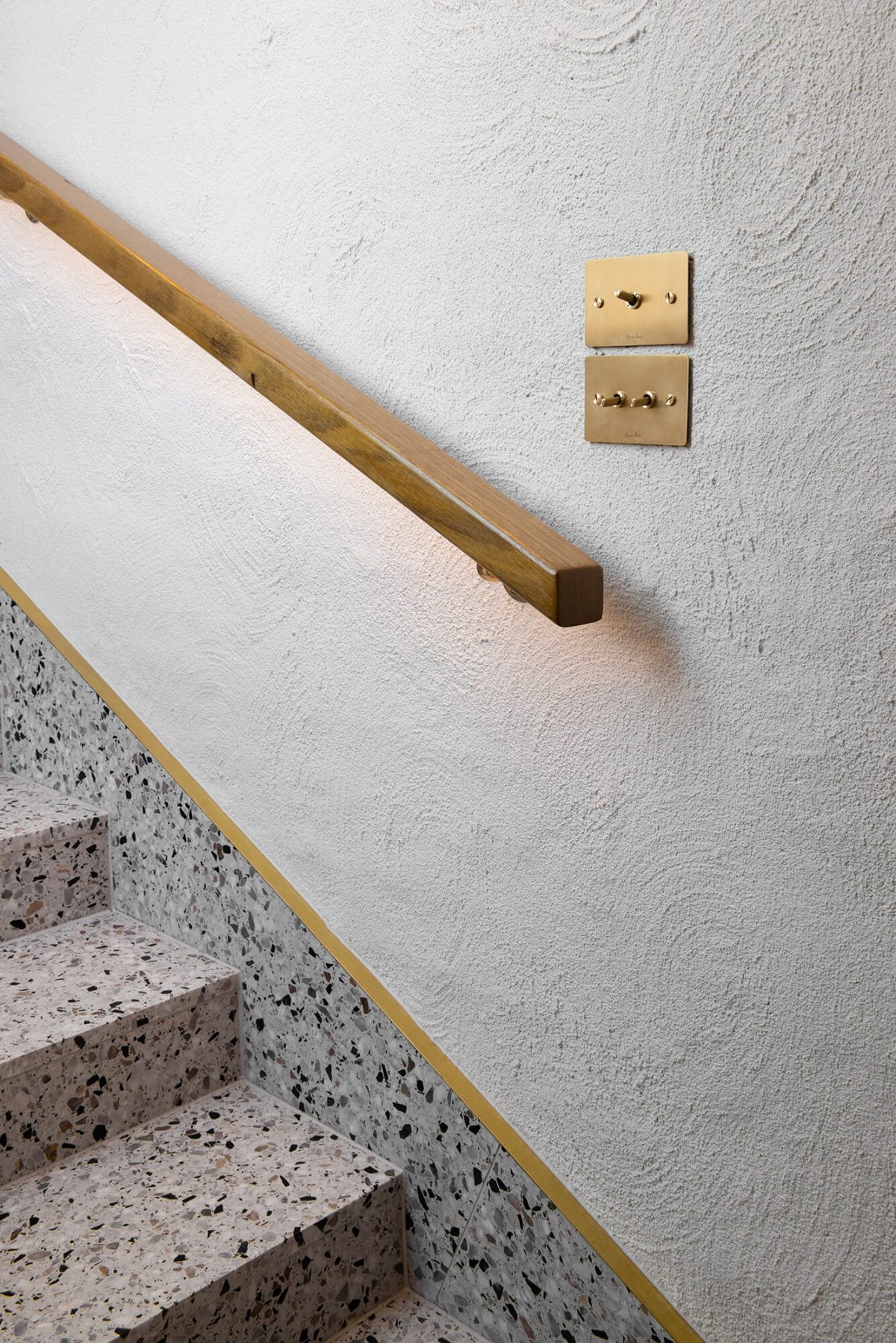 A custom designed hallway featuring terrazzo. Designed and built by MJ Harris Group. #MJHxMasonSt