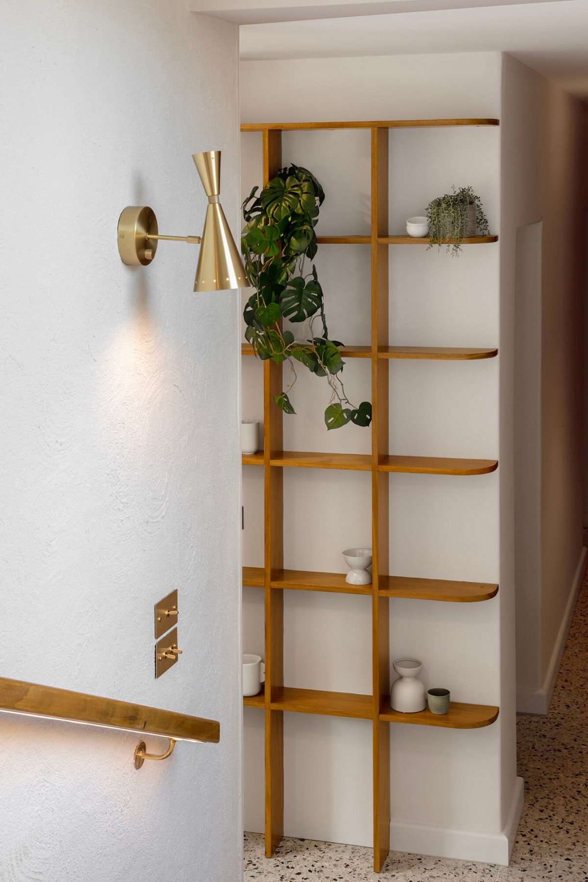 A custom designed hallway featuring terrazzo. Designed and built by MJ Harris Group. #MJHxMasonSt