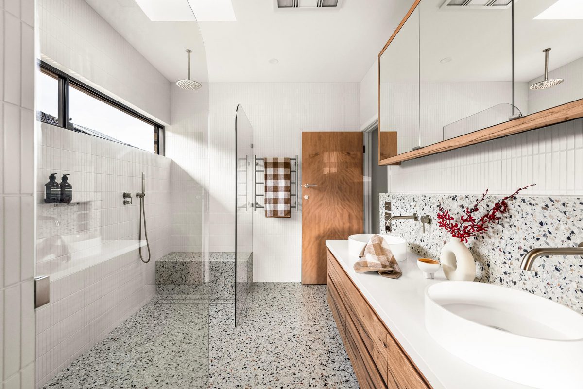 A custom designed bathroom featuring terrazzo tiles. Designed and built by MJ Harris Group. #MJHxMasonSt