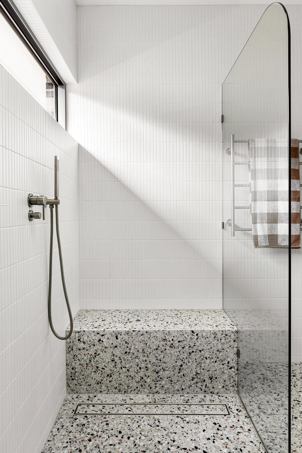 A custom designed bathroom featuring terrazzo tiles. Designed and built by MJ Harris Group. #MJHxMasonSt