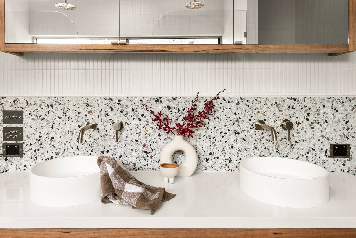 A custom designed bathroom featuring terrazzo tiles. Designed and built by MJ Harris Group. #MJHxMasonSt