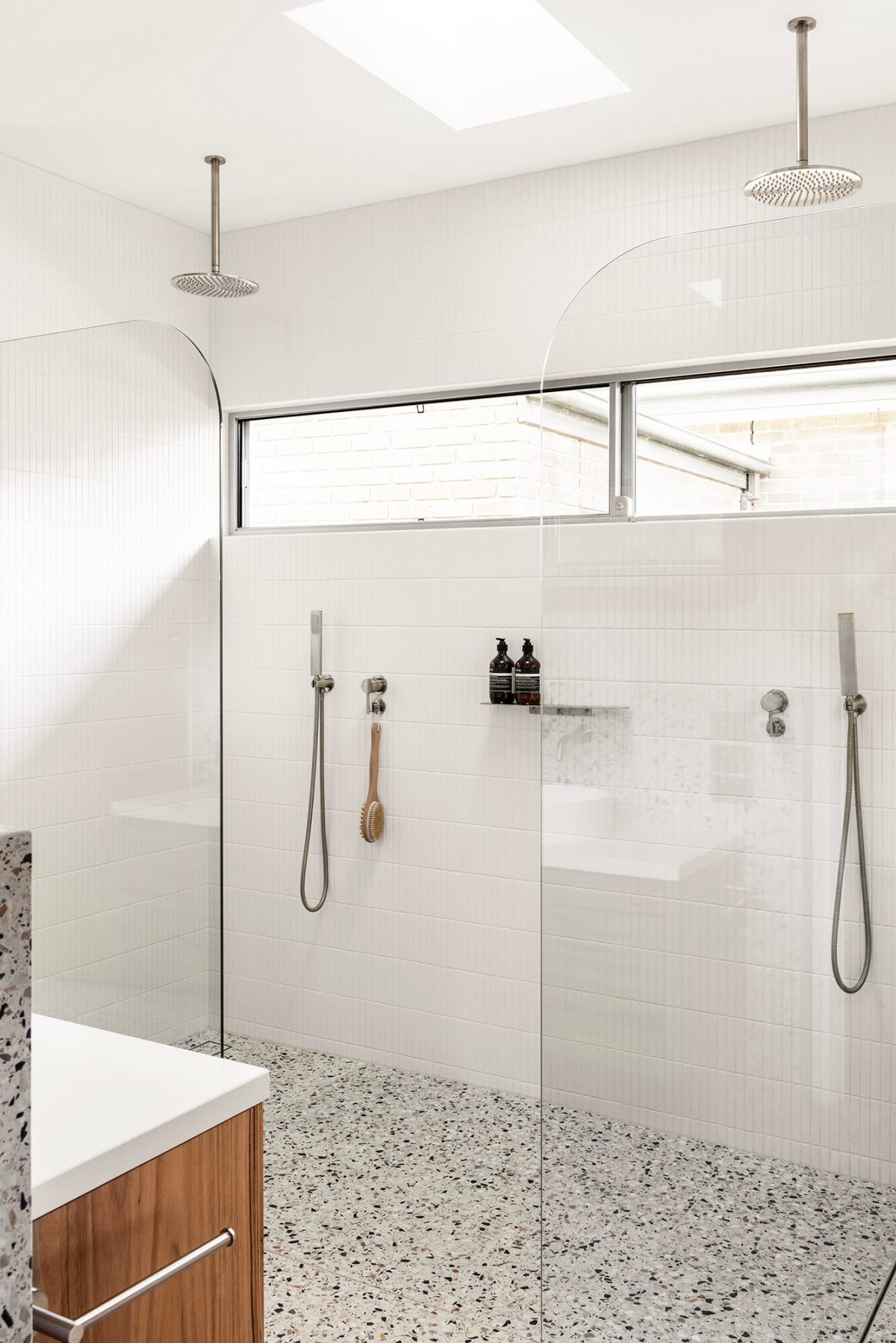 A custom designed bathroom featuring terrazzo tiles. Designed and built by MJ Harris Group. #MJHxMasonSt