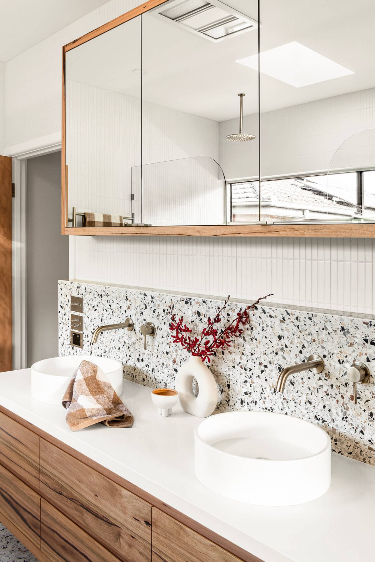 A custom designed bathroom featuring terrazzo tiles. Designed and built by MJ Harris Group. #MJHxMasonSt