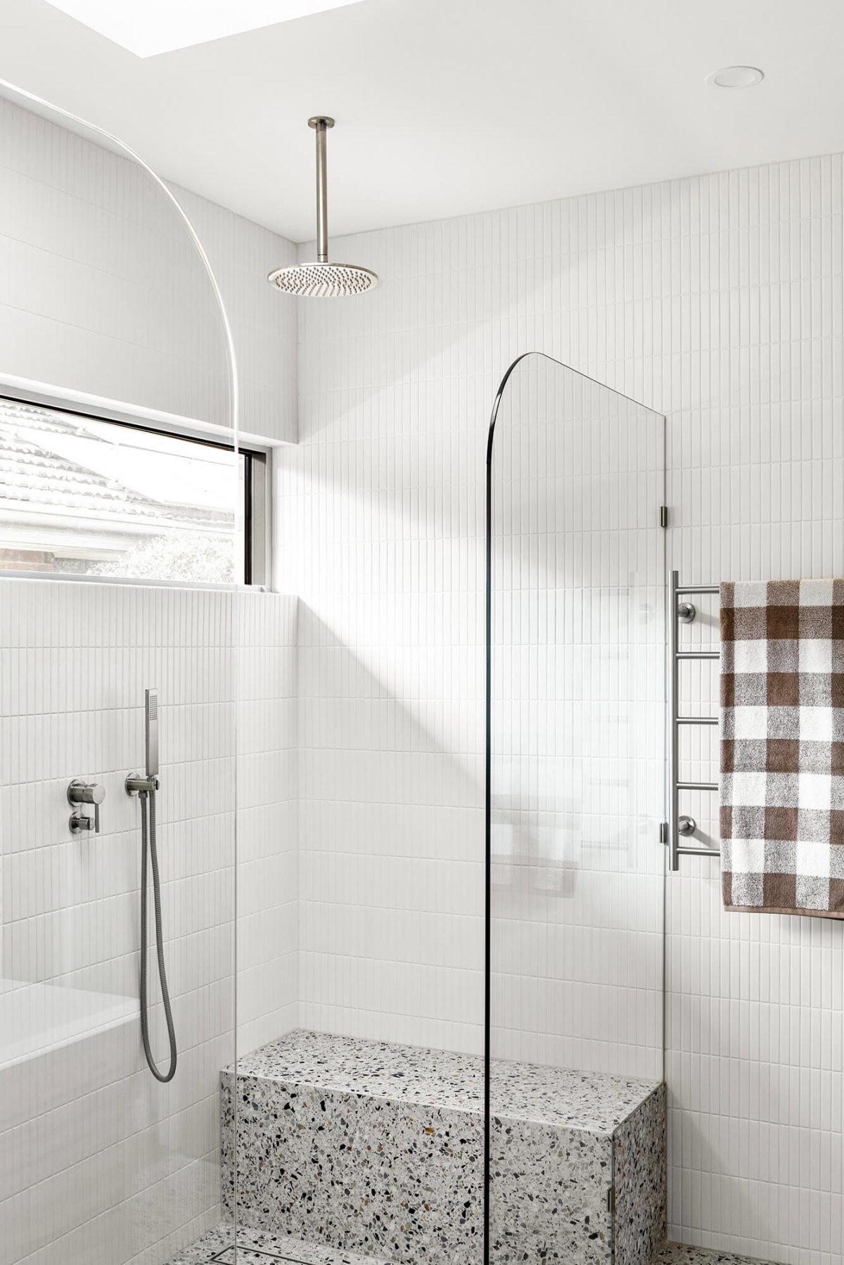 A custom designed bathroom featuring terrazzo tiles. Designed and built by MJ Harris Group. #MJHxMasonSt