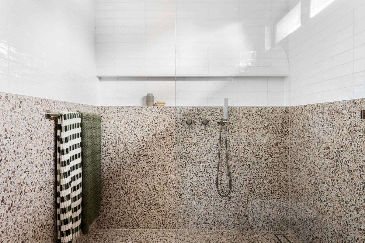 A custom designed bathroom featuring a walk in shower. Designed and built by MJ Harris Group. #MJHxThomasSt