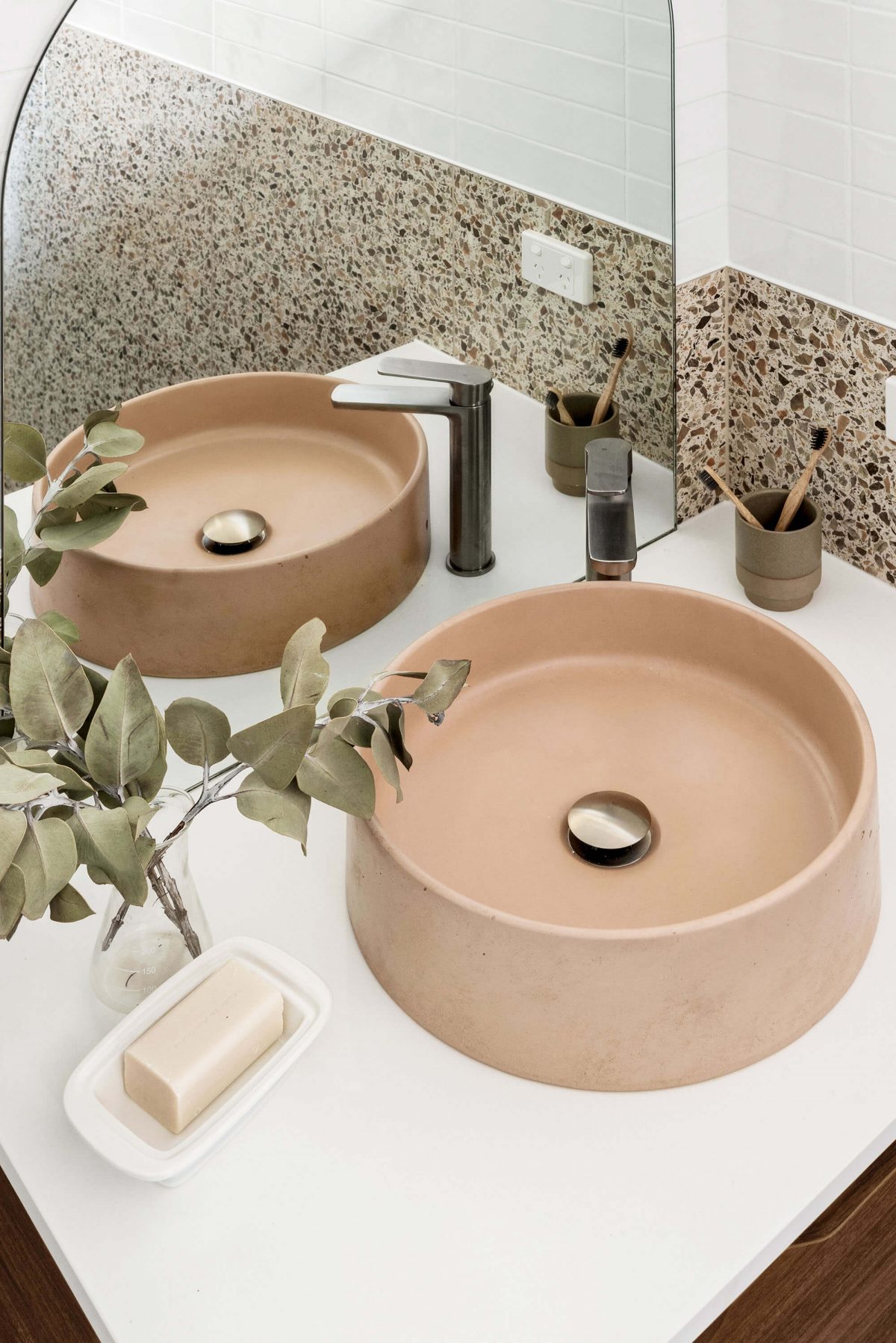 A custom designed bathroom featuring a concrete basin. Designed and built by MJ Harris Group. #MJHxThomasSt