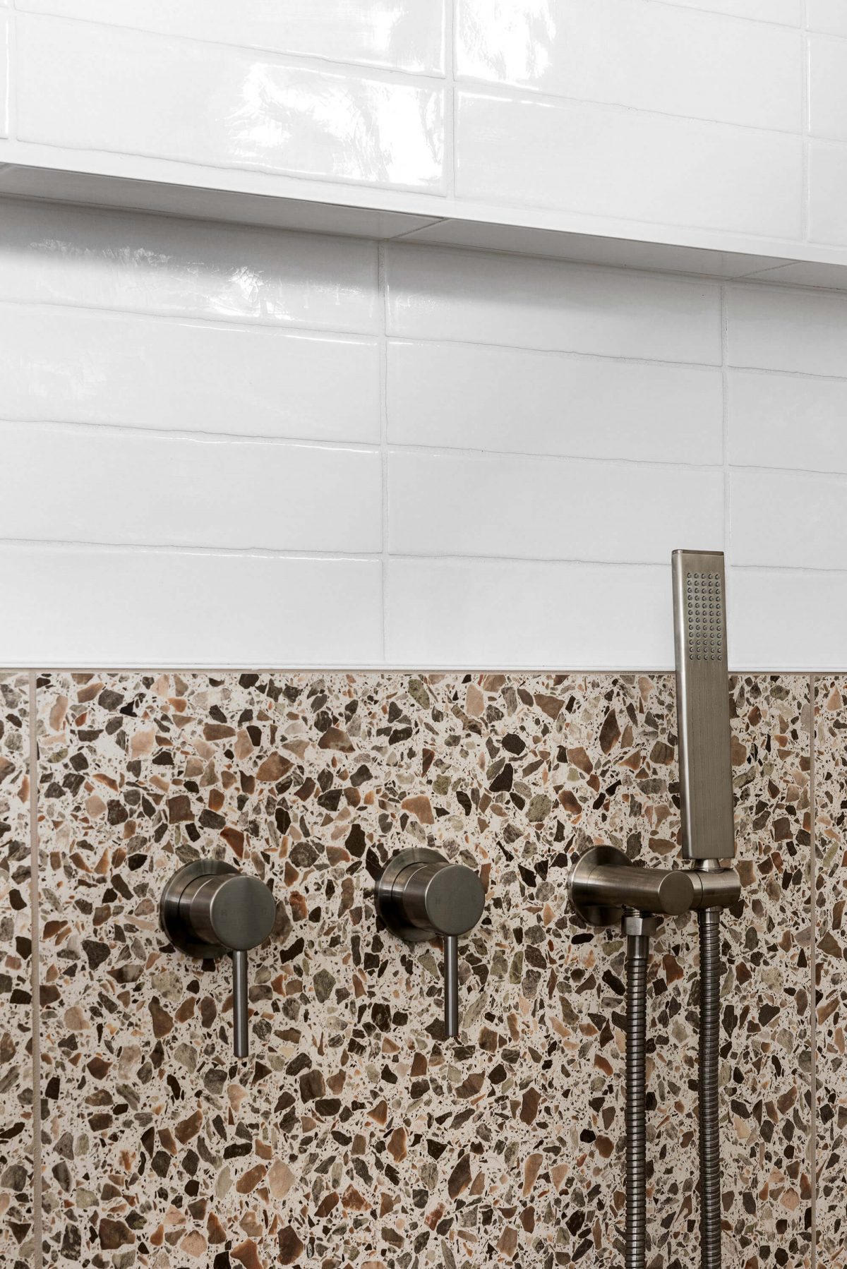 A custom designed bathroom featuring a walk in shower. Designed and built by MJ Harris Group. #MJHxThomasSt
