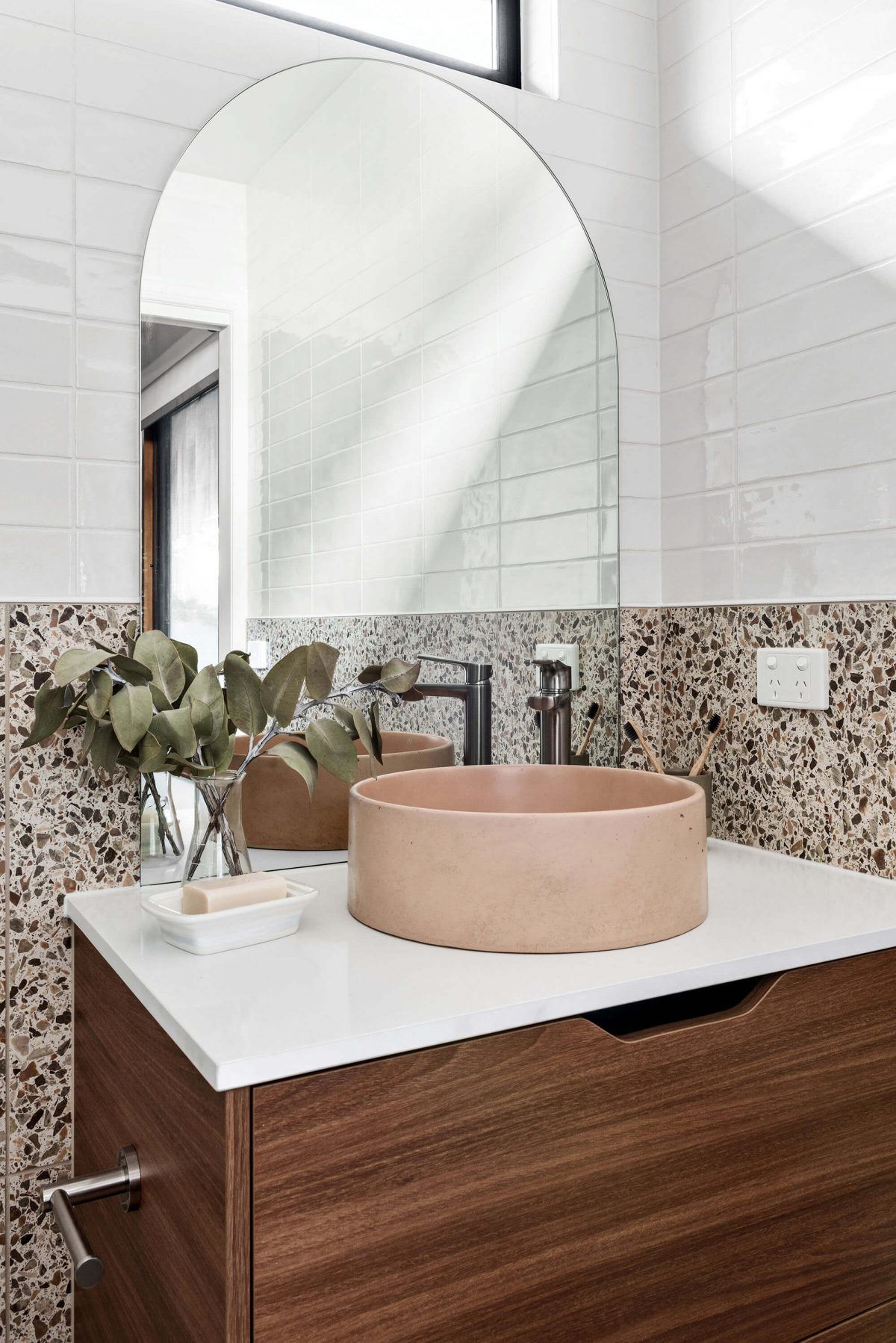 A custom designed bathroom featuring a concrete basin. Designed and built by MJ Harris Group. #MJHxThomasSt