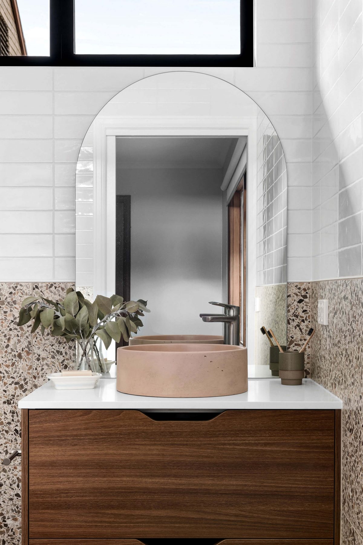 A custom designed bathroom featuring a concrete basin. Designed and built by MJ Harris Group. #MJHxThomasSt