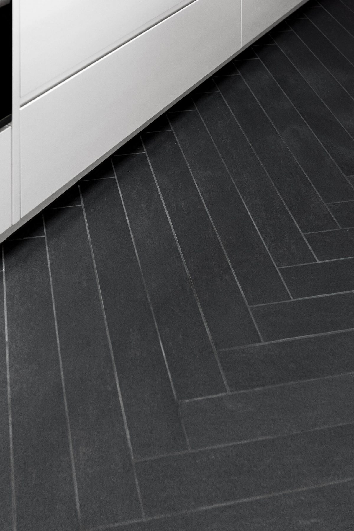 A custom designed kitchen featuring herringbone tiling flooring. Designed and built by MJ Harris Group. #MJHxRoyalAve