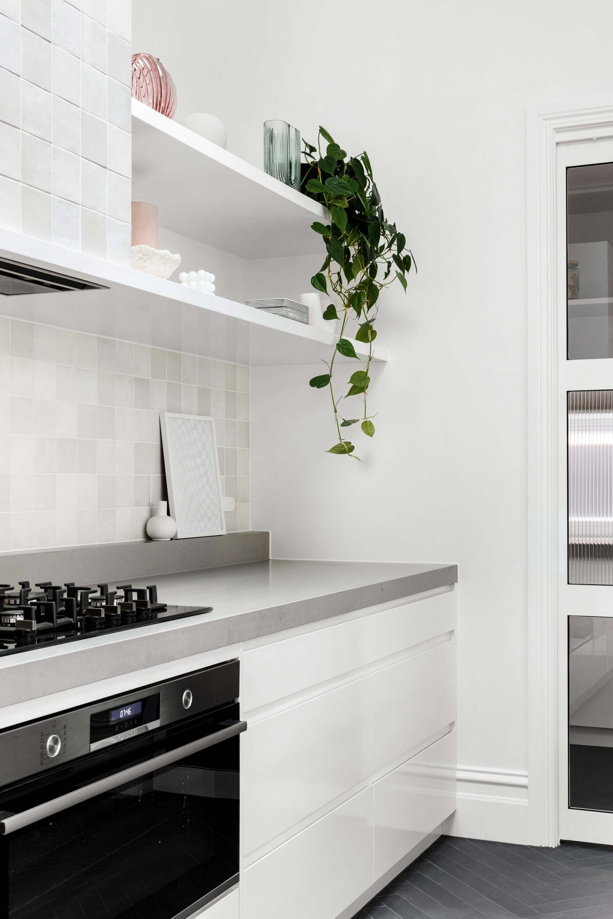 A custom designed kitchen featuring zeolite tiles. Designed and built by MJ Harris Group. #MJHxRoyalAve