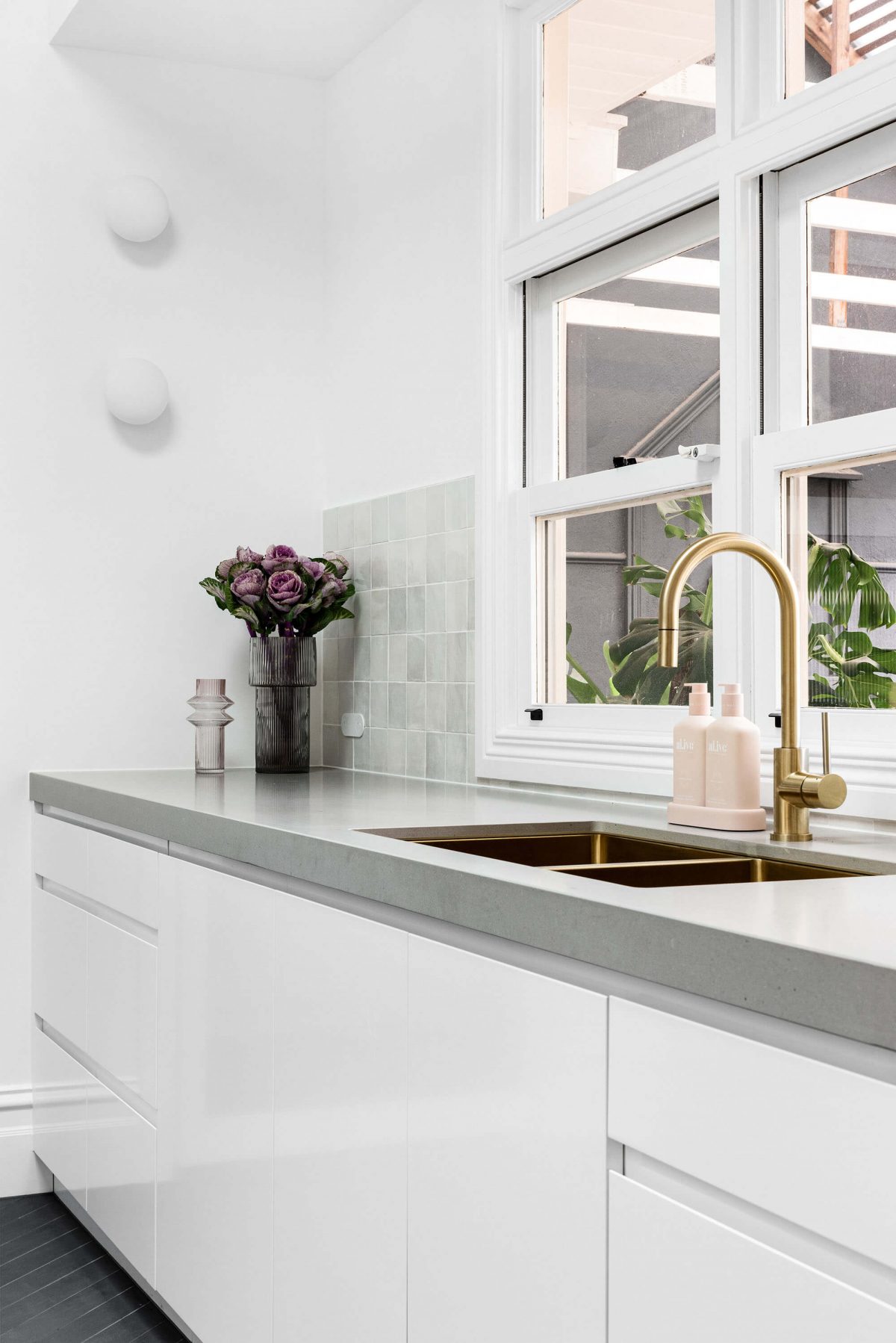 A custom designed kitchen featuring zeolite tiles. Designed and built by MJ Harris Group. #MJHxRoyalAve