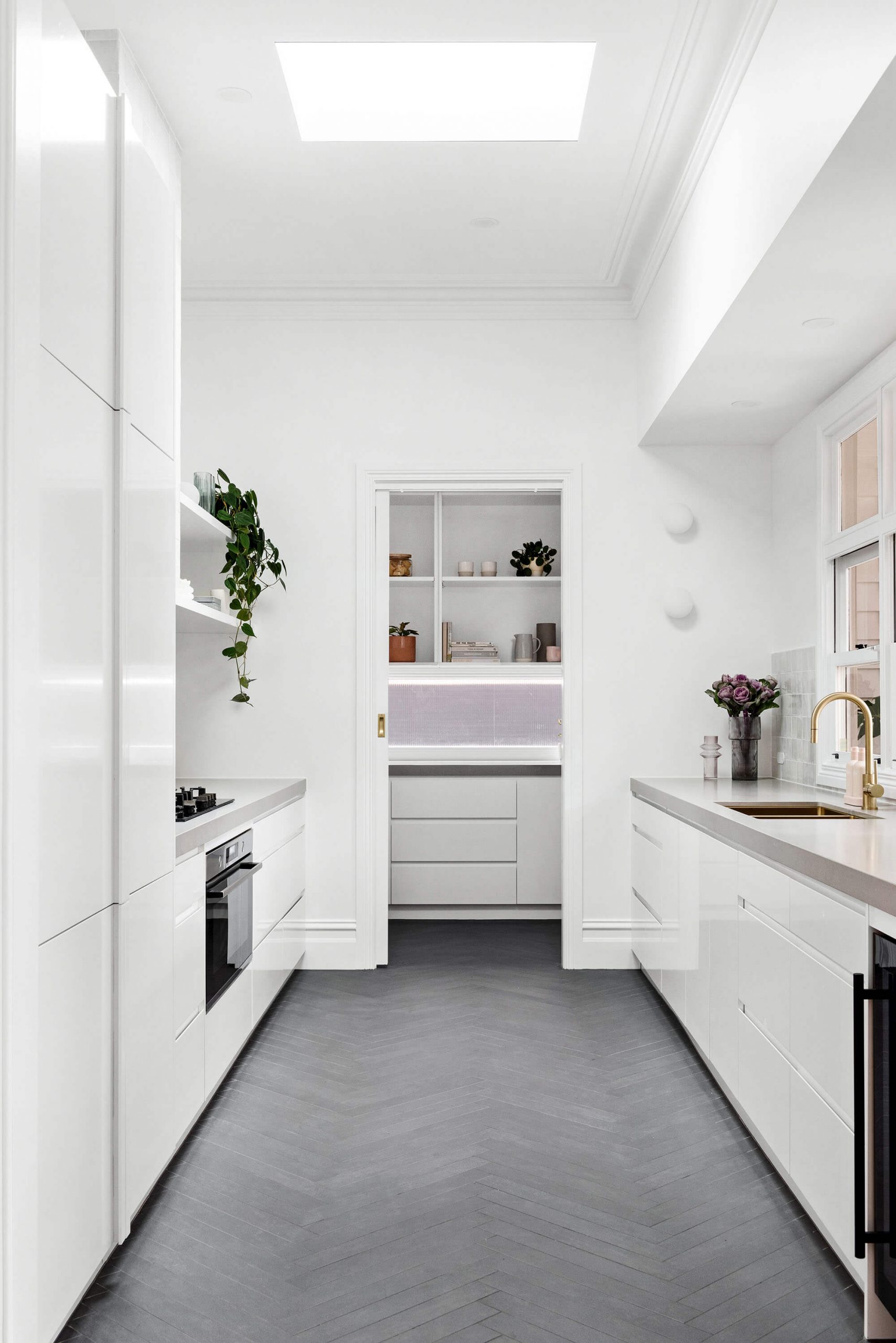 A custom designed kitchen featuring custom joinery. Designed and built by MJ Harris Group. #MJHxRoyalAve