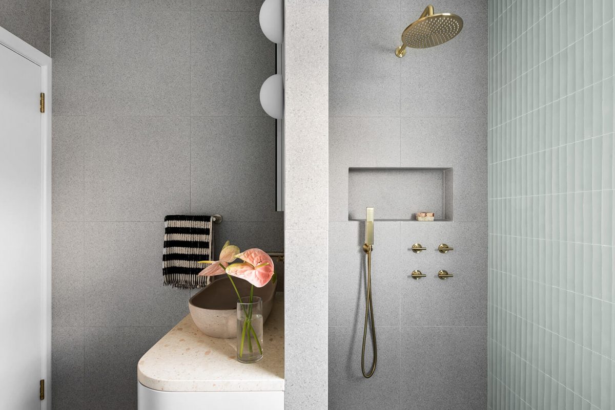 A custom designed bathroom featuring green concave kit kat tile feature wall and walk in shower. Designed and built by MJ Harris Group. #MJHxNaroomaSt