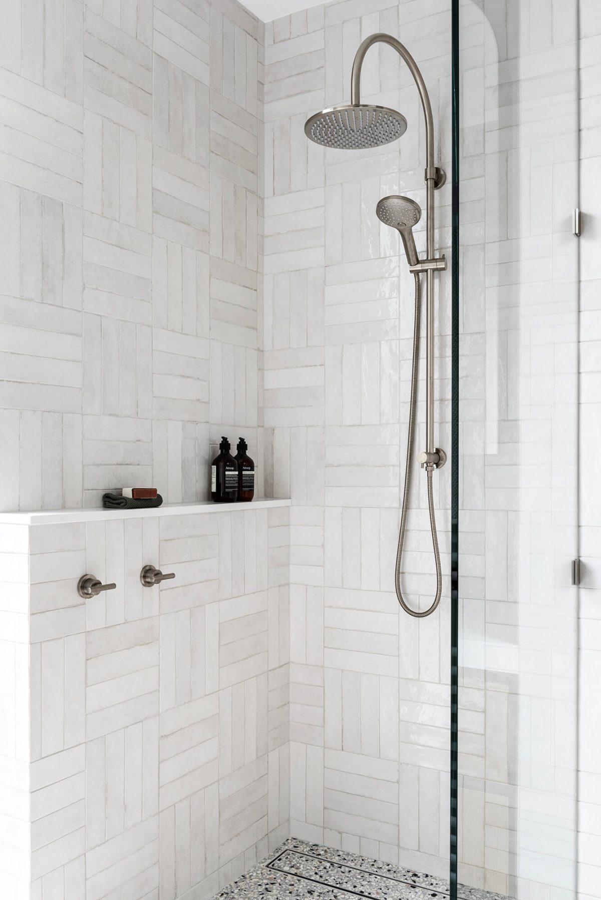 A custom designed ensuite bathroom featuring Melbourne Cross Hatch Spanish Subway Tiles. Designed and built by MJ Harris Group. #MJHxPeppinSt